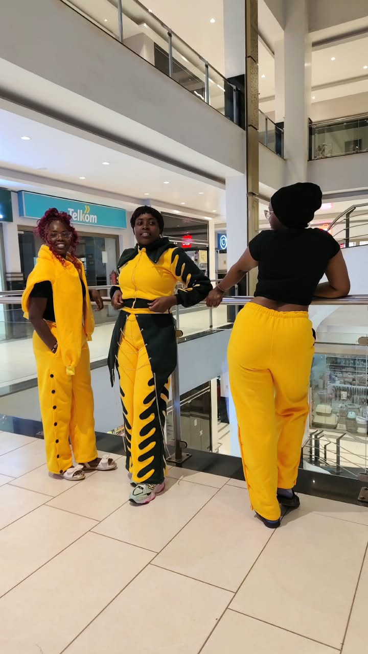 Handcrafted yellow & black applique tracksuit
